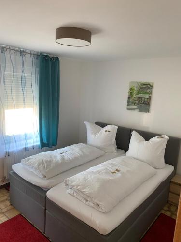 Postel nebo postele na pokoji v ubytování Ferienwohnung Siegen Eiserfeld 3