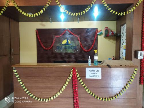 a law firm counter with christmas garland at Sea Winds Hotel, Guhagar in Ratnagiri