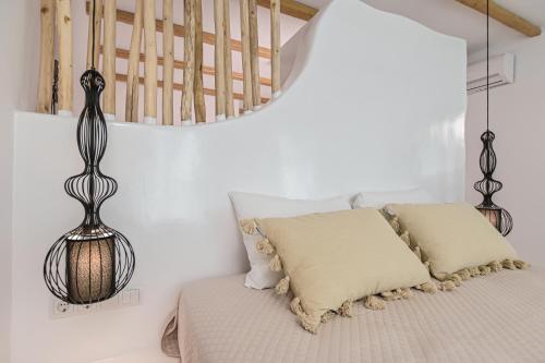 Ένα ή περισσότερα κρεβάτια σε δωμάτιο στο Alykes Studios & Suites