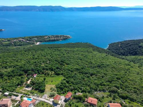 an aerial view of a small island in a body of water at Apartment Marinella - LBN121 by Interhome in Labin