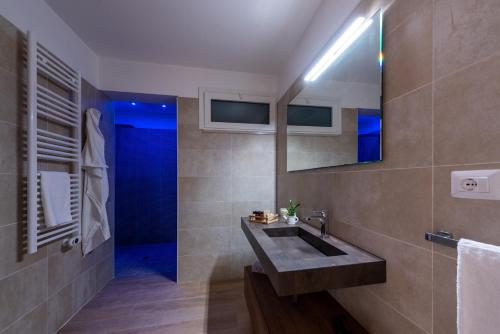 Een badkamer bij Dimora Le Volte