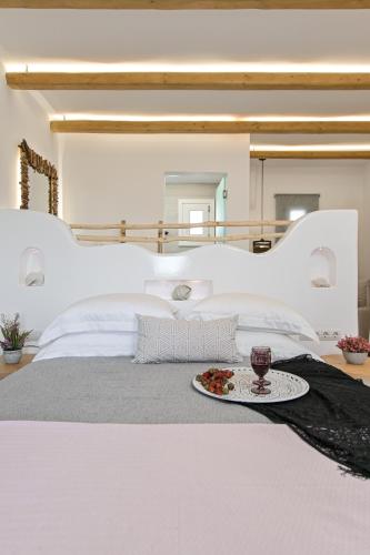 Ένα ή περισσότερα κρεβάτια σε δωμάτιο στο Alykes Studios & Suites
