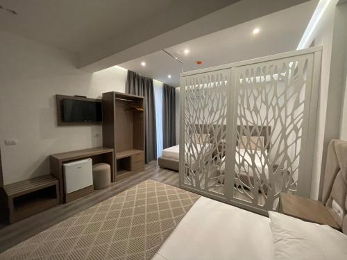 Postel nebo postele na pokoji v ubytování Hotel Mare 2
