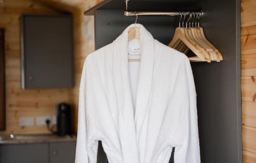 a white towel hanging on a rack in a kitchen at Beau Vista Lodge in Dunnamanagh