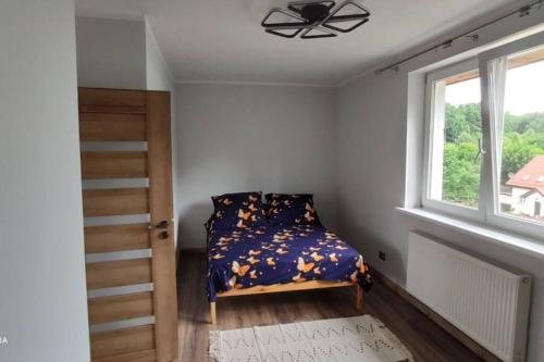 Apartament Stare Jabłonki 객실 침대