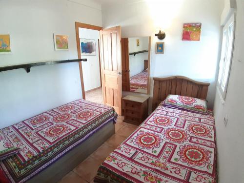 Postel nebo postele na pokoji v ubytování Chalet Miraflores