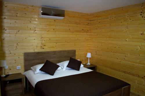 Ένα ή περισσότερα κρεβάτια σε δωμάτιο στο Casa Arina