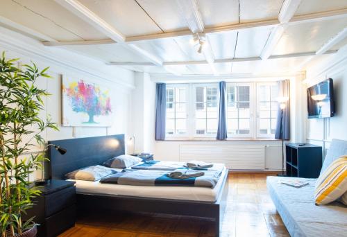 Säng eller sängar i ett rum på HITrental Niederdorf - Apartments