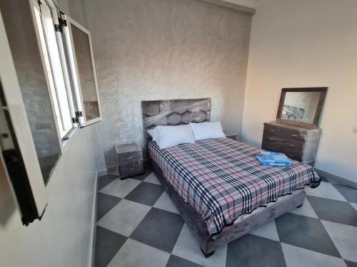 Postel nebo postele na pokoji v ubytování Appartement meublé à louer