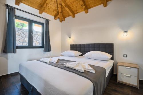 Postel nebo postele na pokoji v ubytování Kamp Lunga +