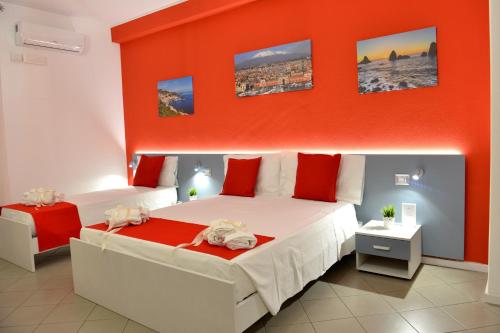 Säng eller sängar i ett rum på Terre di Sicilia