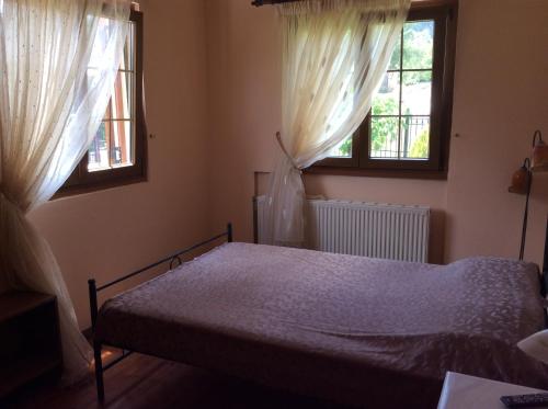 Postel nebo postele na pokoji v ubytování Ey-Giann