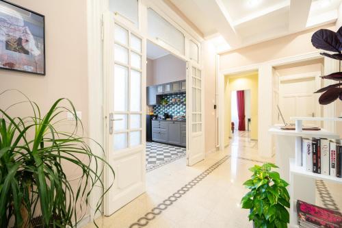 a hallway with a door leading to a game room at Sweet Home Pigneto Guest House in Rome