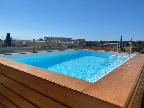 The swimming pool at or near Tal-Karmnu Entire house with private heated pool and jacuzzi