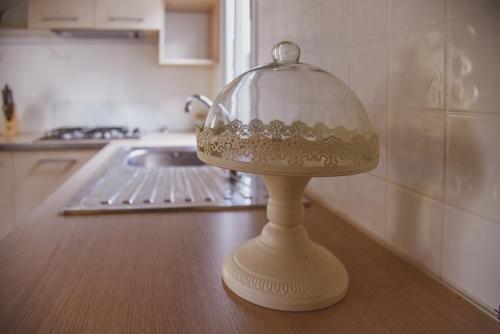 a lamp sitting on a counter in a kitchen at Mobile Homes Bilice in Bilice