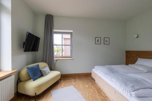 Postel nebo postele na pokoji v ubytování Altstadthotel Eibsen