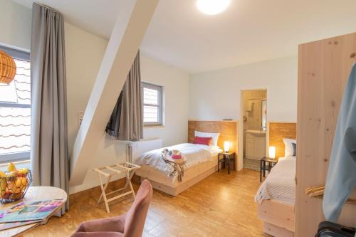 Postel nebo postele na pokoji v ubytování Altstadthotel Eibsen