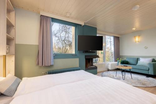 Katil atau katil-katil dalam bilik di Center Parcs De Kempervennen Eindhoven