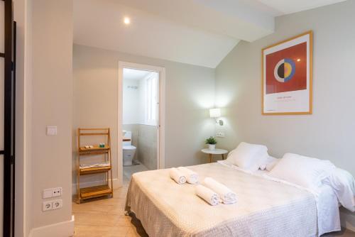 Postel nebo postele na pokoji v ubytování Urbe10 Angel Suites Apartment 4B