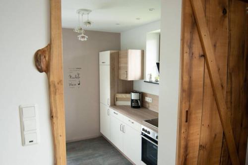 Kuchyň nebo kuchyňský kout v ubytování Ferienwohnung Träwa