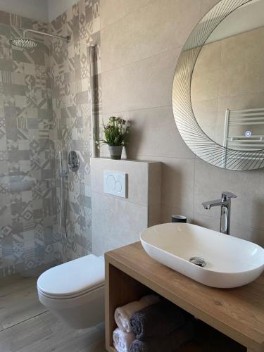 Kúpeľňa v ubytovaní Apartmani Žužić
