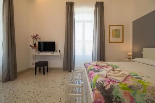 Postel nebo postele na pokoji v ubytování Casa Vacanze Belvedere