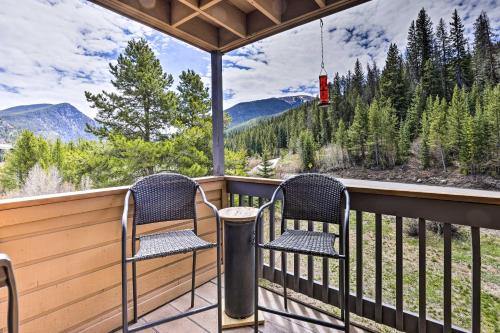 two chairs on a balcony with a view of mountains at Keystone Mountain Getaway Walk to Ski Lifts in Keystone