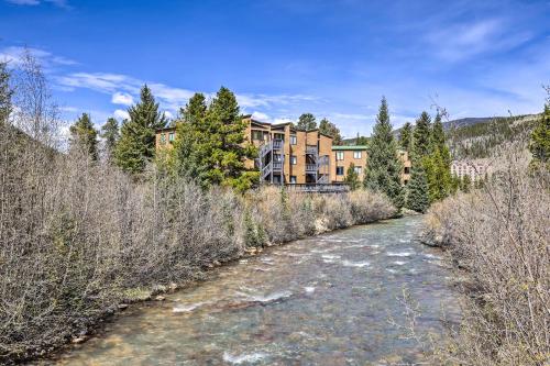 a house on the side of a river with trees at Keystone Mountain Getaway Walk to Ski Lifts in Keystone