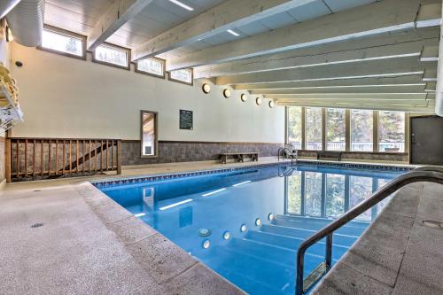 a large swimming pool in a building at Keystone Mountain Getaway Walk to Ski Lifts in Keystone