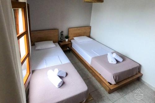 Postel nebo postele na pokoji v ubytování Olivia's Guest House