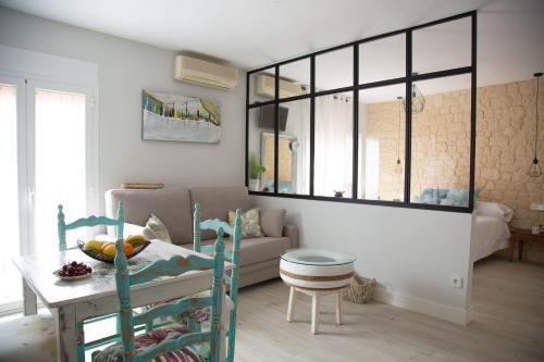 Ruang duduk di Apartamentos Rincón de Cantarranas