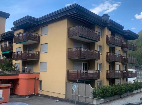 a building with balconies on the side of it at Quellenhof C01 in Davos