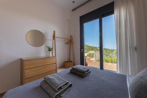 Postel nebo postele na pokoji v ubytování Skiathos Gea Villas