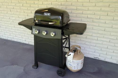 a grill with a toaster on top of it at Farm House stay with soaking tub and hot tub barn in Hammond