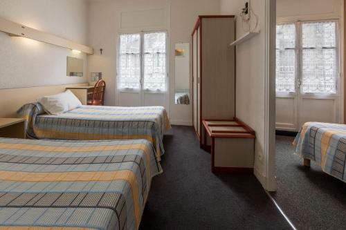 Voodi või voodid majutusasutuse Hotel Printania toas