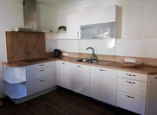 Kuchyň nebo kuchyňský kout v ubytování Appartement Schneeflöckchen