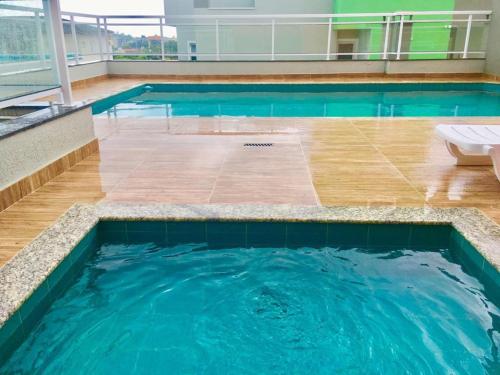 صورة لـ Apto no Itaguá - Varanda Gourmet e Lazer completo في أوباتوبا