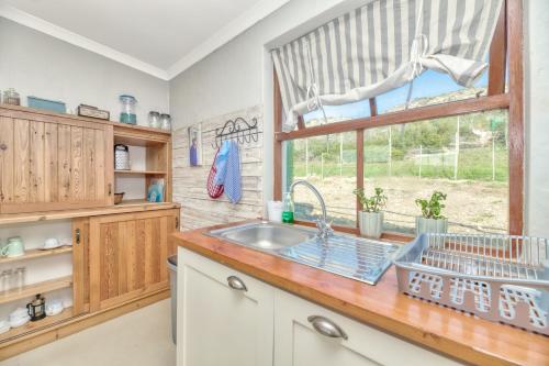 Φωτογραφία από το άλμπουμ του Old Sam's Cottage σε Bredasdorp
