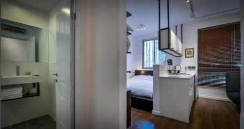 Postel nebo postele na pokoji v ubytování Hanasi 129 - Boutique Apartments