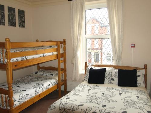 Кровать или кровати в номере Phillips Apartments