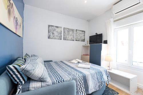 En eller flere senge i et værelse på Azur Studios Cannes