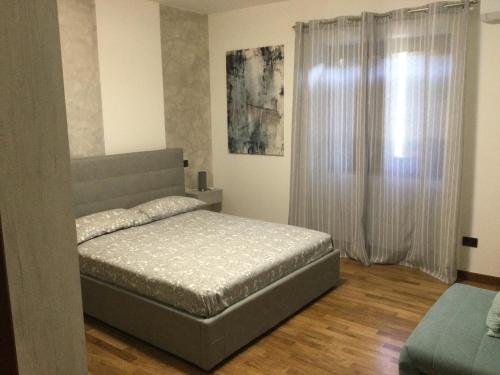 Un pat sau paturi într-o cameră la B&B Corte Sant'Angelo