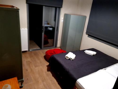 Postel nebo postele na pokoji v ubytování Alexandros
