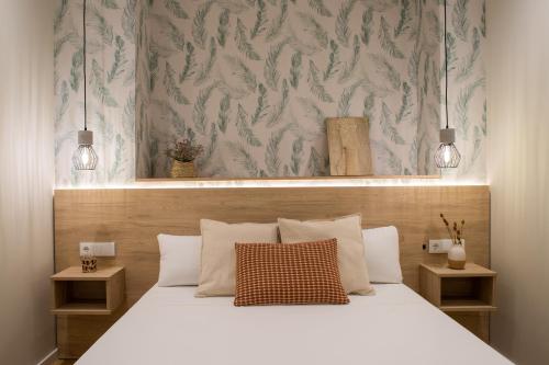 Postel nebo postele na pokoji v ubytování FLORIT FLATS - Valencia Port Rooms II