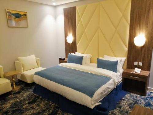 Ein Bett oder Betten in einem Zimmer der Unterkunft فندق ايديا