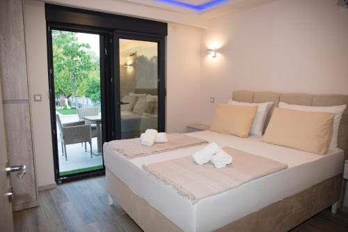 Postel nebo postele na pokoji v ubytování Luxury Villa Magic