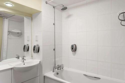 A bathroom at Days Inn Hamilton 