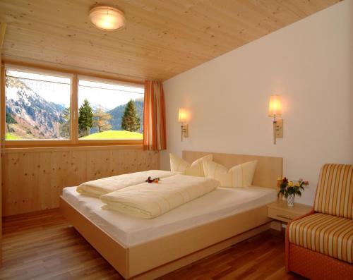 Postel nebo postele na pokoji v ubytování Panoramahof Eggele