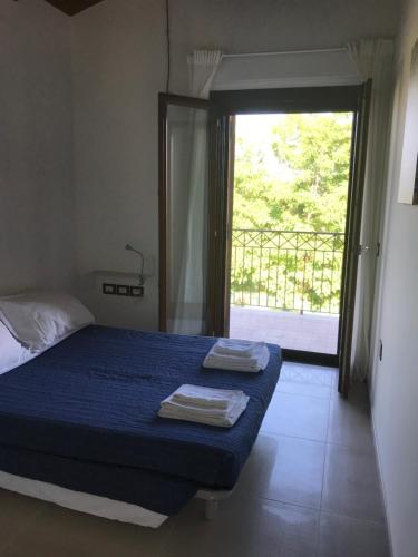 Appartamento “il borgo”, tranquillità e cura a 2 km dal mare tesisinde bir odada yatak veya yataklar