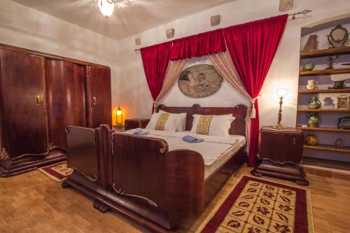 
A bed or beds in a room at Palazzo Drusko Deluxe Rooms
